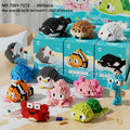 Version Boîte Cadeau de 12 Petites Boîtes Série Petites Créatures de l'Océan Micro Blocs de Construction Granulaires
